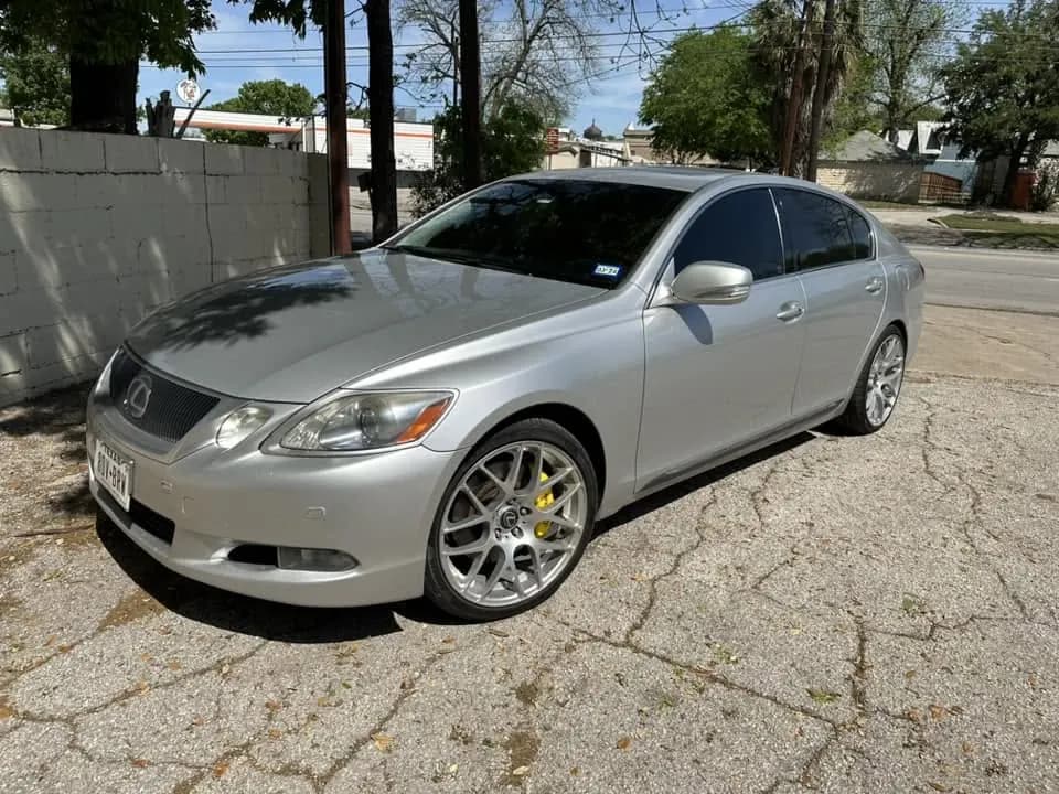Silver Lexus GS with window tint installed, outside the Shade Customs shop in Georgetown, Texas